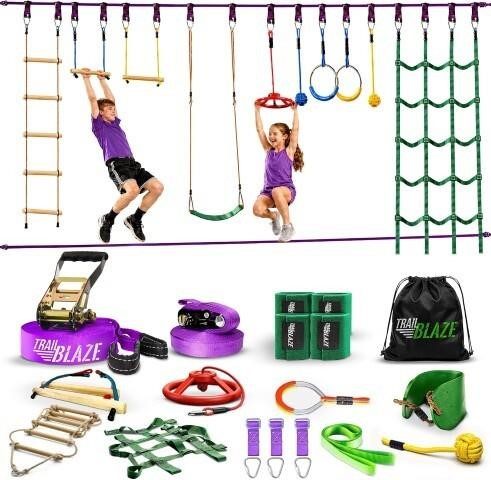 Colorful TrailBlaze ninja warrior obstacle course for kids with two children on slackline, rings, monkey bars, and full component kit