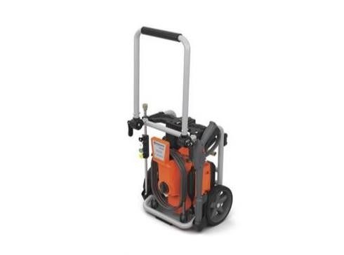Husqvarna 2,300 PSI orange pressure washer on wheeled frame